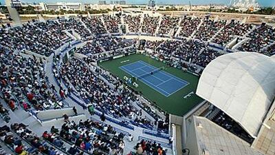 Thousands of tennis fans surround the court at the Zayed Sports City Stadium in Abu Dhabi for the Capitala tournament in January.