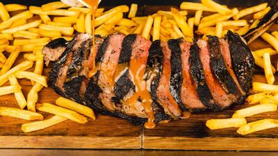 Grilled tomahawk steak at Miss Lily's