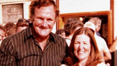 Don Revie in UAE with a young fan wearing a Dubai T shirt.