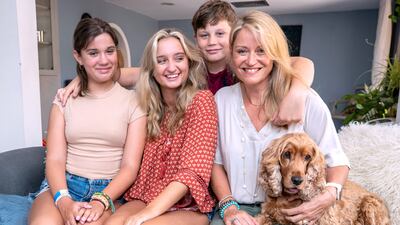 Felice Hurst, a single mother with three kids who lives in villa in old compound at Jumeirah 3 area. (L-R) Scarlett, Liv, Hugo, Felice and Charlie the dog. Victor Besa / The National