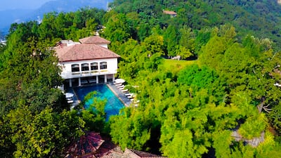 The spa and wellness centre on the resort grounds are surrounded by dense greenery. Photo: Ananda in the Himalayas