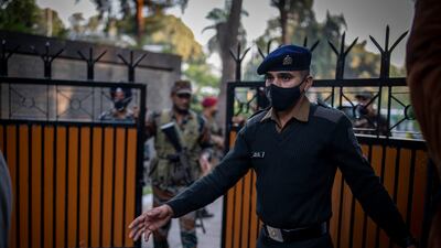 An Indian army soldier stands outside the residence. Gen Rawat had been heading to the Defence Services Staff College (DSSC) to address students and staff from the nearby Sulur air force base in Coimbatore. AP Photo