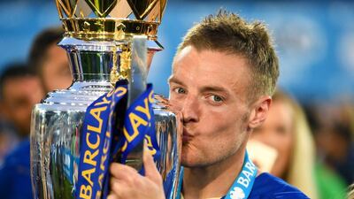 Jamie Vardy of Leicester City kisses the Premier League trophy after their win against Everton on Saturday. Shaun Botterill / Getty Images / May 7, 2016