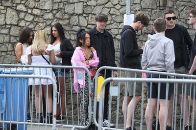 People arrive for the latest in a series of pilot events with crowds. AP