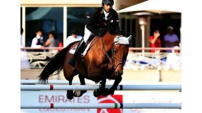 Sheikh Ali Al Qassimi riding Tisanto during the Class 2 at the Dubai Show Jumping Champioships. Satish Kumar / The National