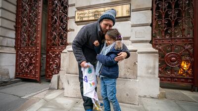 Richard Ratcliffe, the husband of Iranian detainee Nazanin Zaghari-Ratcliffe, with their daughter Gabriella. PA