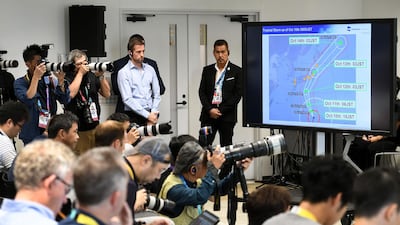 A screen displays the path of the approaching typhoon Hagibis, which will affect upcoming matches in the Japan 2019 Rugby World Cup. AFP