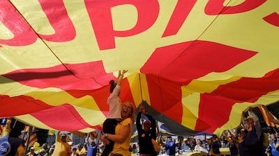Catalans chanted "Freedom for the political prisoners" as they massed on the Parallel Avenue, one of the city's main streets, wearing yellow scarves, sweaters or jackets - tthe colour chosen to show solidarity with the jailed leaders. AP/Manu Fernandez