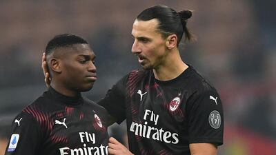 Zlatan Ibrahimovic and forward Rafael Leao at the end of the match. AFP