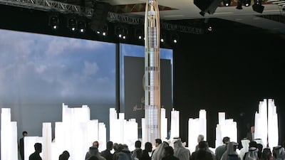 Saudi Arabia’s Prince Al Waleed bin Talal last year invited Emaar chairman Mohammed Alabbar to team up with his property development company Kingdom Holding to build a mile-high tower. The prince said he was looking at various cities, but where better than Dubai where the Burj Khalifa currently holds the world’s tallest record - although the Kingdom Tower in Jeddah is set to overtake it. Back in 2008 three designs were drawn up for the Dubai City Tower in Jumeirah Garden City, with six single buildings twisting into a single 1.5-mile structure. Pictured is a model of the Nakheel Harbour & Tower project from 2008, which was planned to stretch two-thirds of a mile. Kamran Jebreili / AP Photo