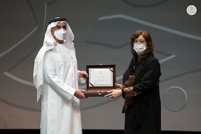 Sheikh Saif bin Zayed Al Nayhan, Deputy Prime Minister of the UAE, gives the Sheikh Zayed Book Award to Maisoon Saqer at Louvre Abu Dhabi. Photo: Arabic Language Centre