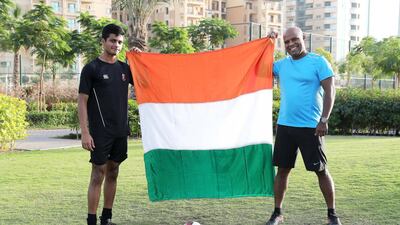 Indian football fans Cris Clive and father Laurel will be cheering on their country against UAE on Thursday. Pawan Singh / The National