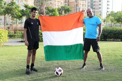 Football is by no means India's first sport but more fans, including Cris Clive and Dad Laurel Clive, are embracing it. Pawan Singh / The National