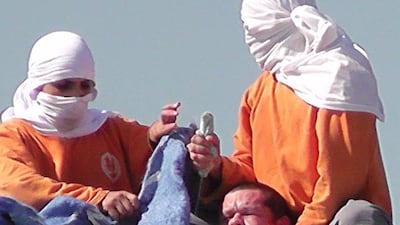 Grab taken from CGN of inmates taking a hostage at a prison in Parana, Brazil on August 24, 2014. Inmates rioting to press for better facilities in an overcrowded Brazilian jail have beheaded two fellow prisoners and taken two guards hostage, officials said. AFP Photo / CGN
