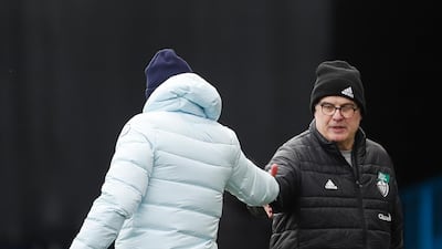 Leeds United's head coach Marcelo Bielsa, right, shakes hand with Chelsea's head coach Thomas Tuchel. AP
