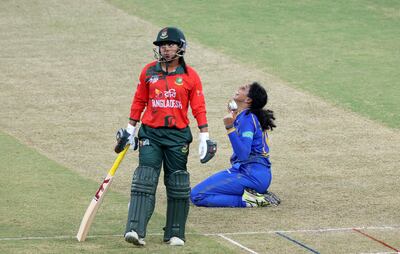 UAE's Suraksha Kotte celebrates taking the wicket of Bangladesh's Nigar Sultana. Chris Whiteoak / The National