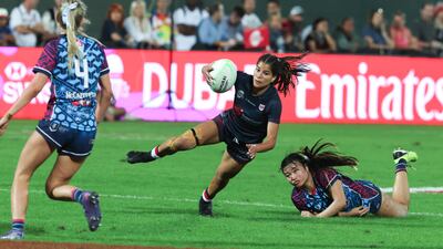 Dubai Warriors take on Dubai College during the Gulf Under-19 Girls final at the Emirates Dubai Sevens. Victor Besa / The National