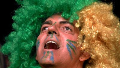 A Brazil's supporter watches the Copa America final. AFP