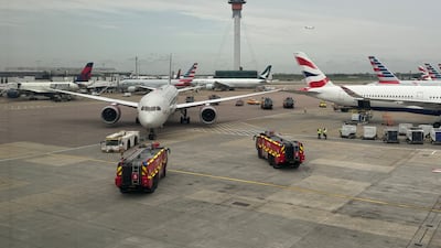 The Virgin Atlantic and British Airways aircraft surrounded by emergency vehicles at Heathrow in an image posted to social media site X. PA