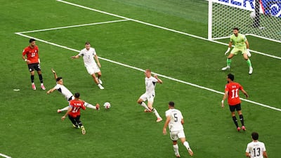 Egypt's Mohamed Salah scores their second goal past New Zealand's Max Crocombe. Reuters