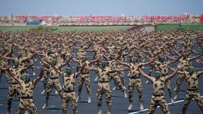 Members of the Egyptian Armed Forces participate in the inauguration of the Mohamed Naguib Military Base. Rashed Al Mansoori.