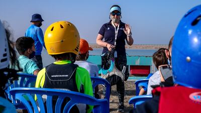 Last-minute safety reminders by Instructor Stephanie before they hit the water.