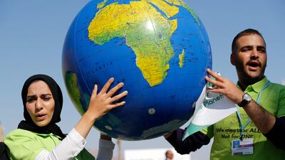 Demonstrators at the global summit shout slogans. AFP