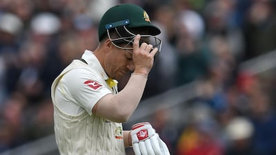Australia's David Warner walks back to the pavilion after losing his wicket for no runs on the first day of the fourth Ashes Test. AFP