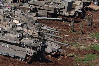 Israeli tanks at a military outpost at the border with Lebanon. EPA