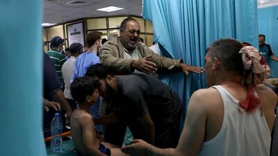 Palestinians inside a hospital in the northern Gaza Strip. Nine people were killed amid air raids in the Gaza Strip, local authorities said. It was unclear whether the deaths were caused by the air strikes. Israel said it bombed Hamas targets in Gaza in response to rocket fire directed towards Israel. AFP