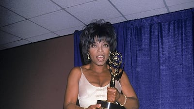 Oprah Winfrey wears a pink floral corseted dress to attend the Daytime Emmy Awards on May 1, 1994. Getty Images