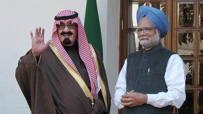 Mr Singh with Saudi Arabia's late King Abdullah, in New Delhi, in 2006. Bloomberg