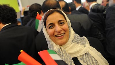 Sheikha Lubna smiles as she celebrates Dubai's Expo victory in Paris. Antoine Antoniol / Getty Images