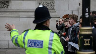 A police officer guards a cordon outside the Houses of Parliament after the attack last week. Daniel Leal-Oliva / AFP