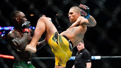 Alex Pereira kicks Israel Adesanya during the first round of their middleweight title bout at UFC 281 on November 13, 2022 in New York. AP