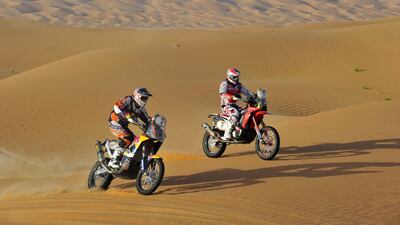 Marc Coma, left, has become a legend in racing through deserts thanks to five wins in the Dakar Rally and six Cross-Country Rallies world titles. Courtesy Abu Dhabi Desert Challenge