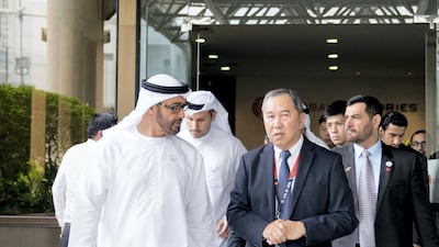 Sheikh Mohamed bin Zayed tours Mubadala's GlobalFoundries semiconductor facility. He is seen with Kay Chai Ang, senior vice president and general manager for GlobalFoundries Asia and Europe Operations, right. Eissa Al Hammadi for the Ministry of Presidential Affairs