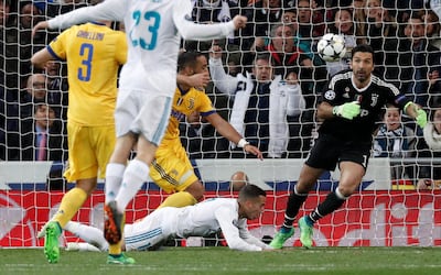 Real Madrid's Lucas Vazquez is fouled by Juventus' Medhi Benatia resulting in a penalty being awarded to Real Madrid. Paul Hanna / Reuters