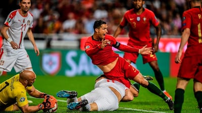 Portugal superstar Cristiano Ronaldo, centre, has gone through many slumps during his international career. Patricia de Melo Moreira / AFP