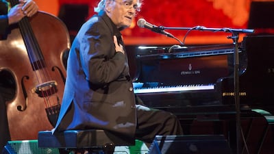 Veteran composer, pianist and bandleader Michel Legrand will celebrate his 85th birthday with a performance at Dubai Opera on Thursday. Jordi Vidal / Redferns / Getty Images.
