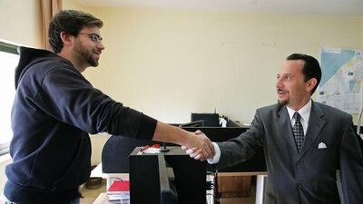 The American journalist Jared Malsin, left, with the US Consul General in Jerusalem, Daniel Rubinstein, right