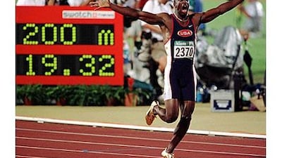 Michael Johnson screams in triumph at the end of the 200m final at the Atlanta Olympics.