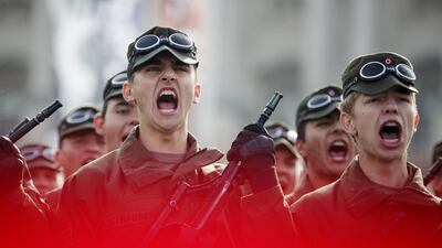 Recruits of the Austrian armed forces scream during the swearing-in ceremony on Austrian National Day (Nationalfeiertag) on Heldenplatz square in Vienna, Austria. Lisi Niesner / EPA