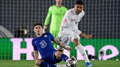 Real Madrid's Casemiro challenges Chelsea's Christian Pulisic. AFP