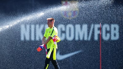 Barcelona goalkeeper Marc-Andre ter Stegen walks onto the pitch on Tuesday for the training session ahead of the Champions League final. David Ramos / Getty Images