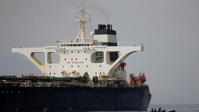 Gibraltar defence police officers guard the Iranian oil tanker Grace 1 as it sits anchored after it was seized earlier this month by British Royal Marines off the coast of the British Mediterranean territory on suspicion of violating sanctions against Syria, in the Strait of Gibraltar. REUTERS/Jon Nazca