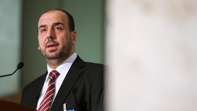 Syria's main opposition High Negotiations Committee spokesman Nasr Al Hariri addresses a press conference after a meeting with the UN special envoy for Syria during peace talks in Geneva on March 31, 2017. Fabrice Coffrini / AFP