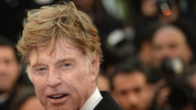 Robert Redford, the US actor and director, arrives for a screening of the film "All is Lost" presented Out of Competition at the festival. Anne-Christina Poujoulat / AFP