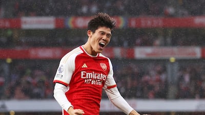 Takehiro Tomiyasu celebrates after scoring Arsenal's final goal. Getty Images