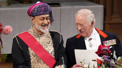King Charles III shares a joke with Sultan Haitham of Oman at a state visit for the Gulf leader at Windsor Castle in England. Getty Images